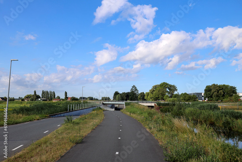 Pastures with farms and roads in the future Fifth Village of the Zuidplaspolder of the municipality of Zuidplas photo