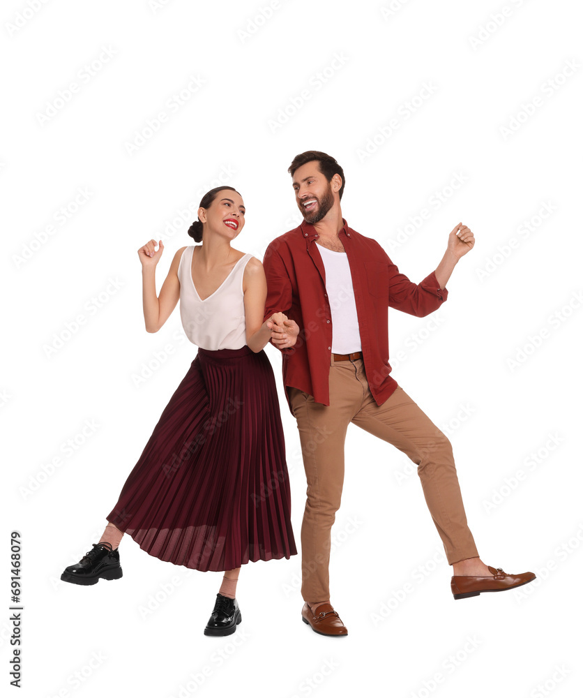 Happy couple dancing together on white background
