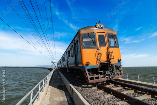 Thai locomotive train on the bridge over the Pa Sak River beautiful country of thailand at Pa Sak Cholasit Dam Lopburi Province photo