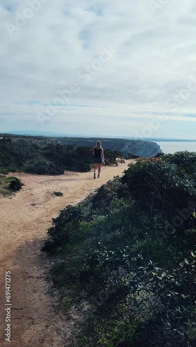 Rocky Algarvian coast in the southwestern part of Portugal. Portugal Hiking Rota Vicentina the Fisherman's Trail, Coastline to Wild and Rugged Beaches Cliff Side Paths Atlantic Ocean . Vertical Shot