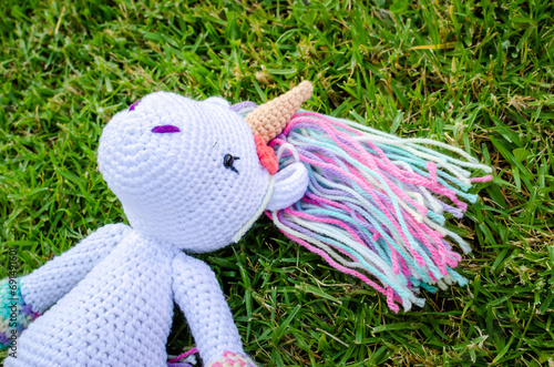 Toy rabbit on a grass