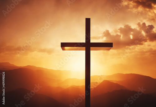 cross on blurry sunset background .