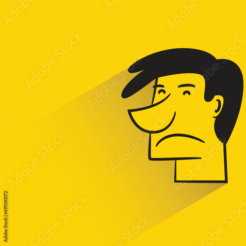 male face side view avatar with shadow on yellow background