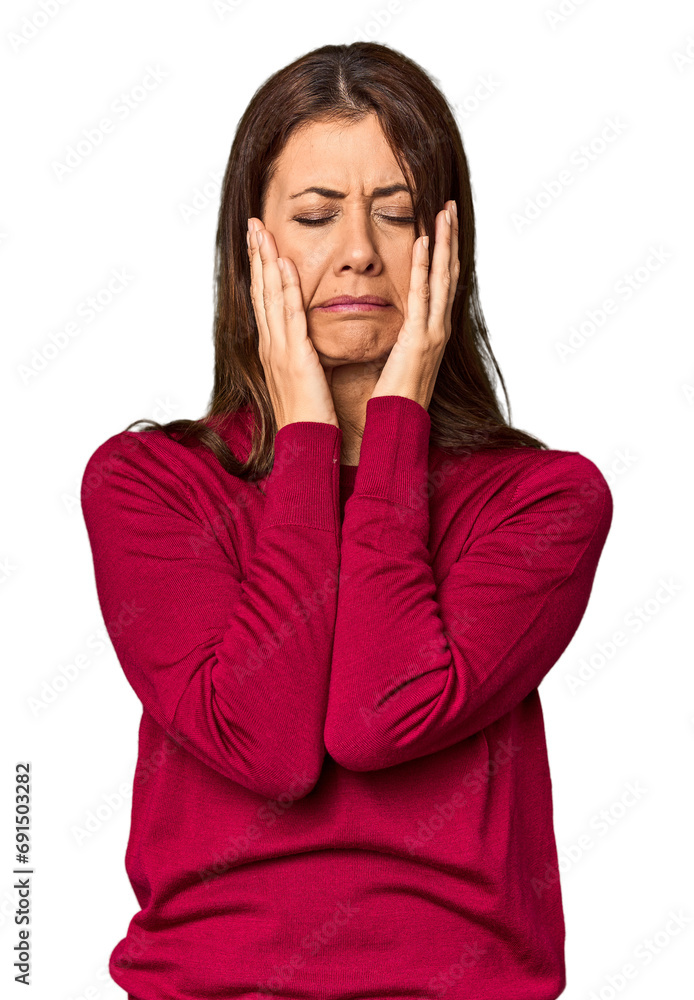 Elegant middle-aged Caucasian woman in studio setting crying, unhappy with something, agony and confusion concept. Elegant middle-aged Caucasian woman in studio setting crying, unhappy with something, agony and confusion concept.