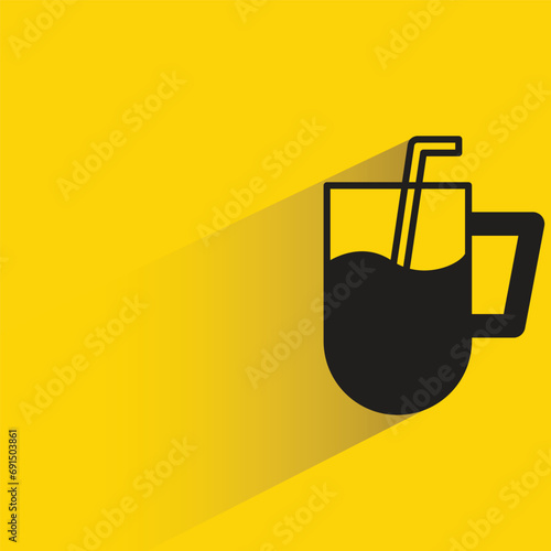 water glass with shadow on yellow background