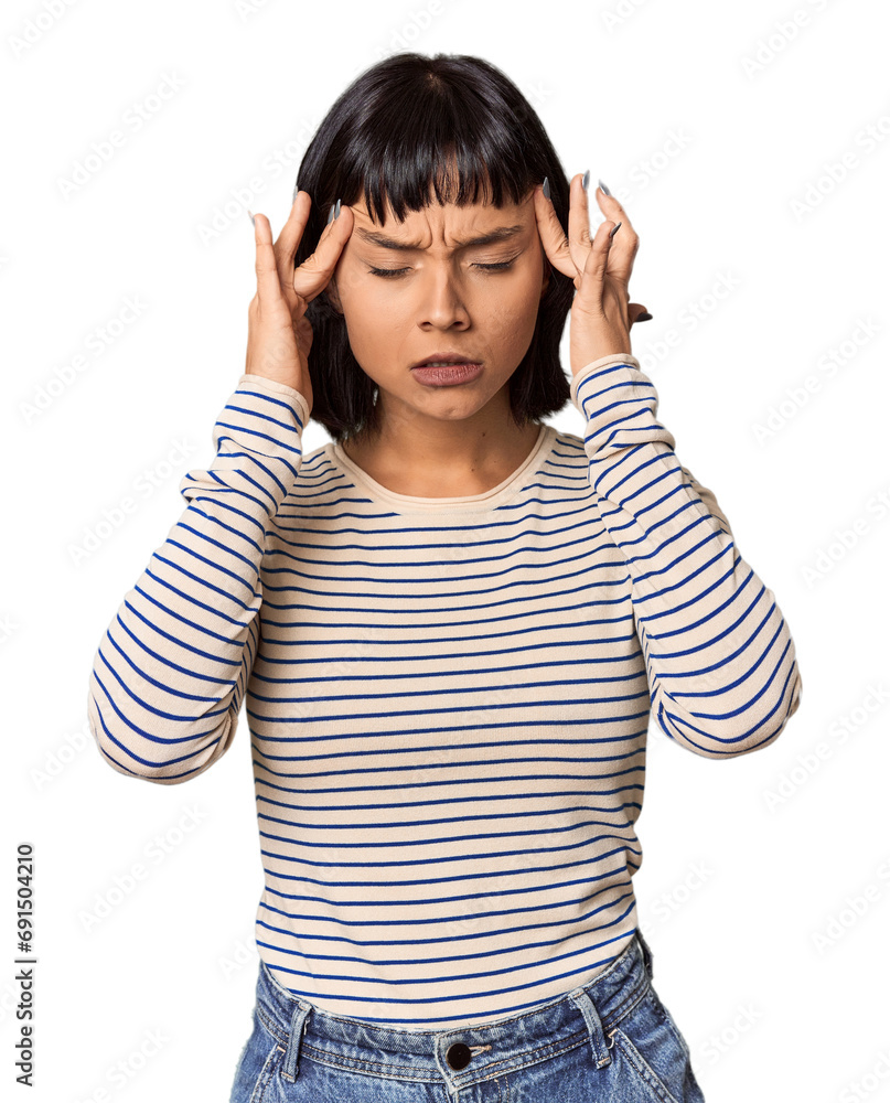 Young Hispanic woman with short black hair in studio touching temples and having headache. Young Hispanic woman with short black hair in studio touching temples and having headache.