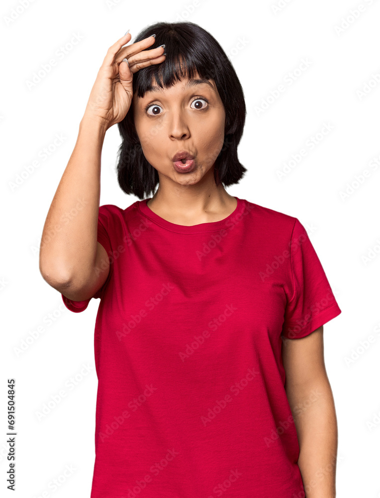 Young Hispanic woman with short black hair in studio shouts loud, keeps eyes opened and hands tense. Young Hispanic woman with short black hair in studio shouts loud, keeps eyes opened and hands tense.