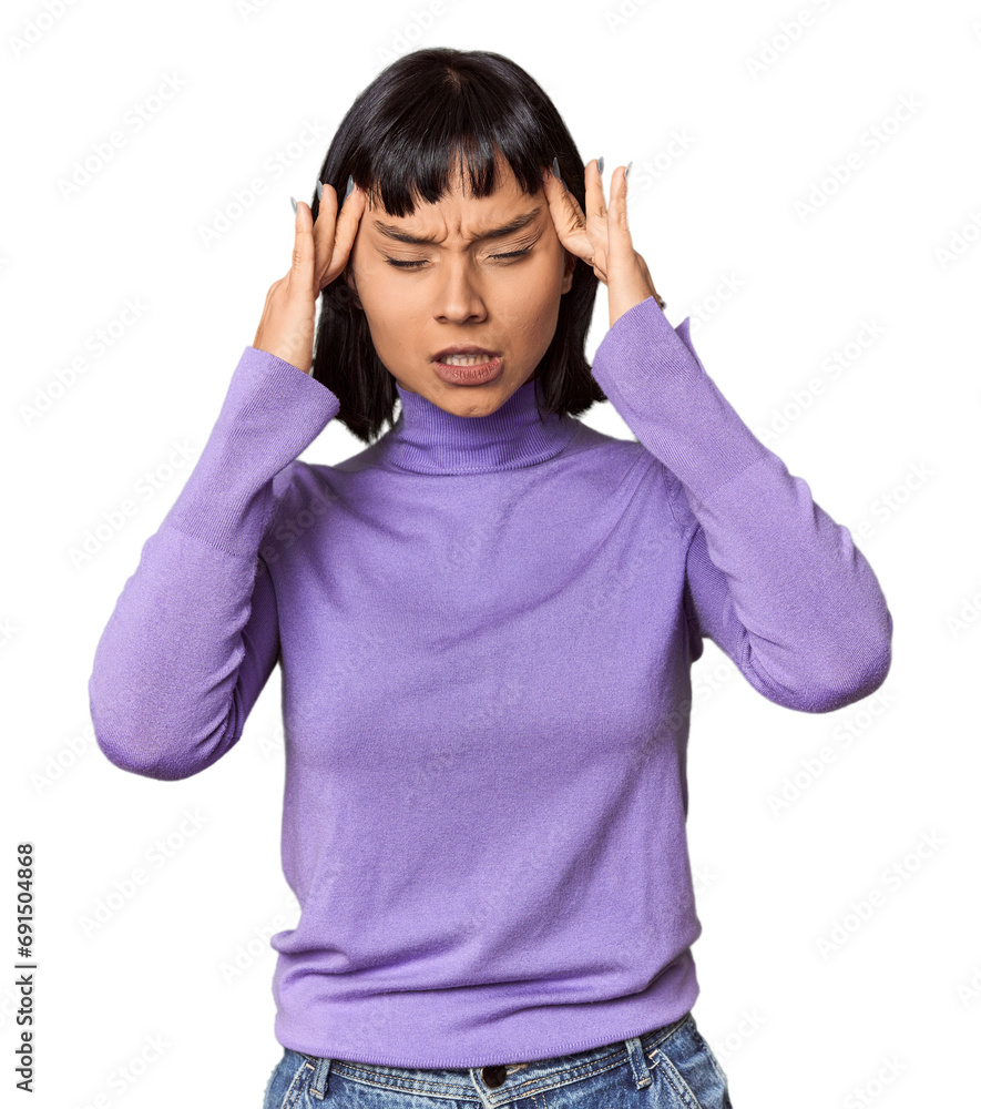 Young Hispanic woman with short black hair in studio touching temples and having headache. Young Hispanic woman with short black hair in studio touching temples and having headache.