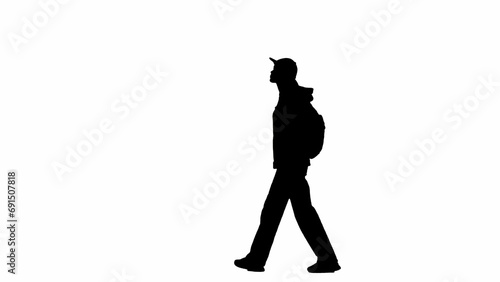 Portrait of traveler isolated on white background alpha channel. Silhouette of woman walking with backpack in cap and looking around.
