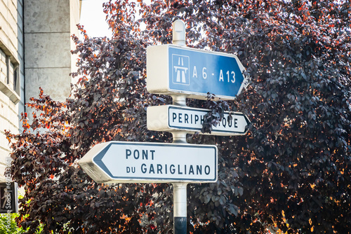 A6, A13, Pont du Garigliano and Peripherique road signs outside the city of Paris, France photo