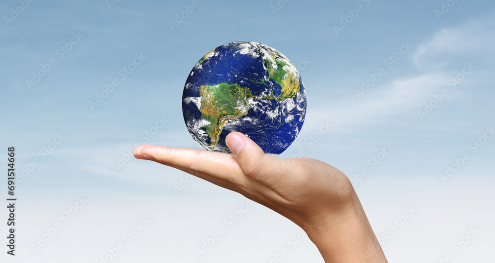 Glass globe in hand,Energy saving concept Glass globe in hand,Energy saving concept