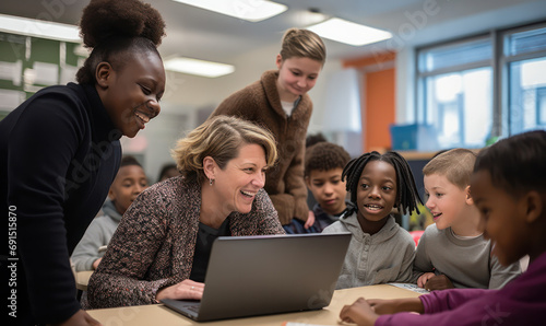 Tech Education, Teacher Guides Diverse Group of Students in a Modern, Technology Classroom. © pkproject