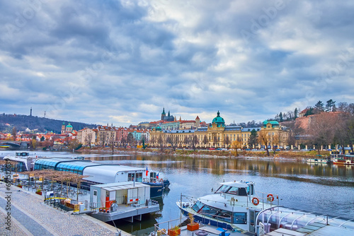 Vltava River and Straka Academy in Prague, Czechia photo