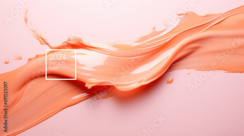 Cosmetic cream in peach fuzz color, trend of 2024 year. Close-up detail of a smear of cream or lipstick. photo