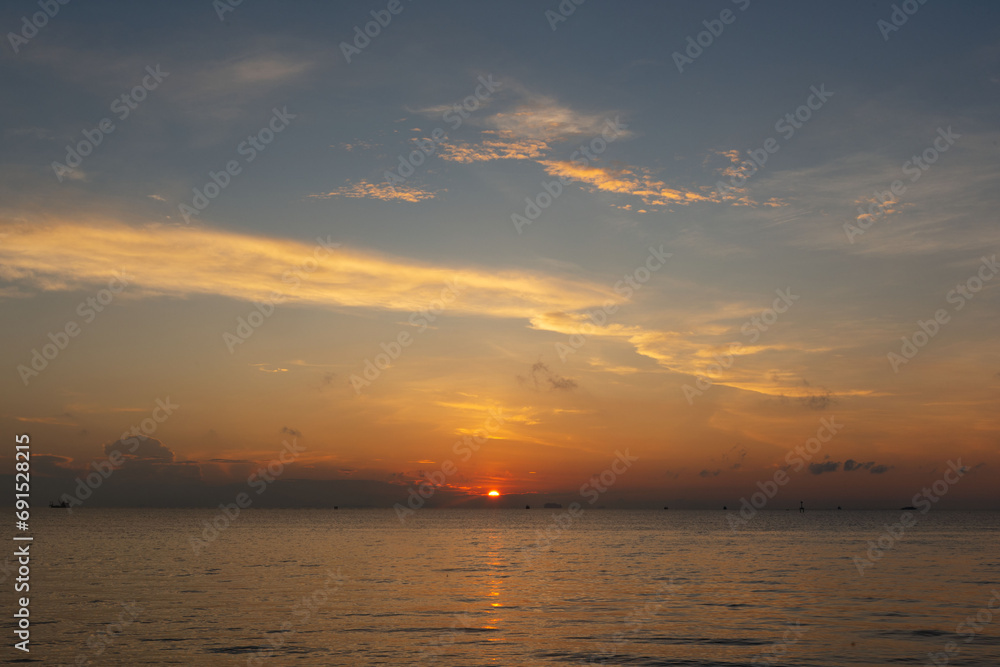 Beautiful sunrise in the sea at Phuket city
