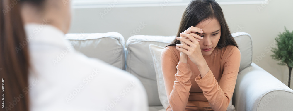 Young woman in a mental therapy session talking with a psychologist in the office. Young woman in a mental therapy session talking with a psychologist in the office.