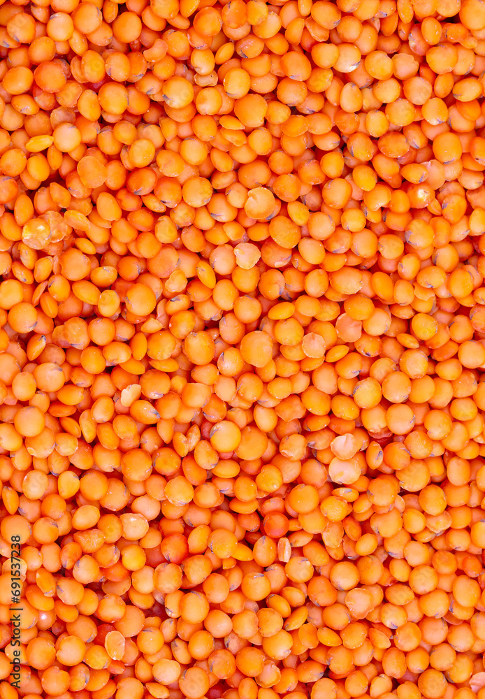 Red lentils. lentil texture, lentil pattern, background, macro.
