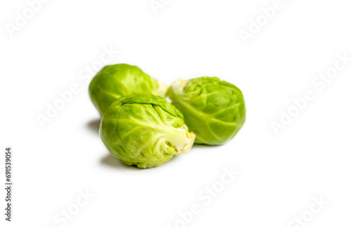 Green fresh brussels sprouts on the white background