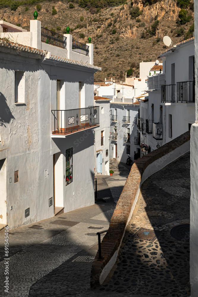 Andalusian white village, pedestrian streets, historical charm, Mediterranean serenity. Frigiliana, Spain