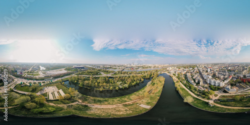 Beautiful sunset panoramic aerial drone view to panorama of Warsaw modern City with skyscraper and The PGE Narodowy National Stadium 360 photo