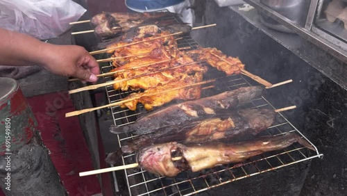 catfish and chicken on the grill