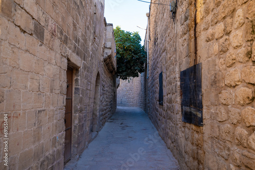 Narrow stone streets in Mardin city center.