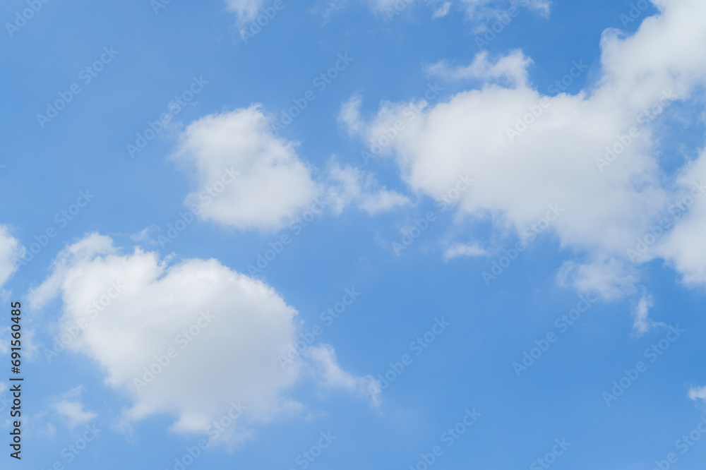 Vibrant colors dance in the sky as sunlight breaks through fluffy clouds. Vibrant colors dance in the sky as sunlight breaks through fluffy clouds.