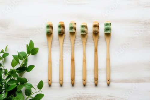 Eco natural bamboo toothbrushes on rustic background