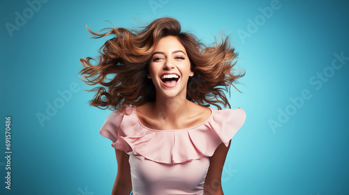 Young woman funny happy, smile cheerful with pastel blue background
