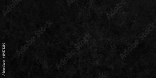 Scary Wall Black Stone Concrete Texture with scratches, the Color black a gloomy background with textured wall, floor or old grunge backdrop, vintage distressed grunge texture with grainy stains.