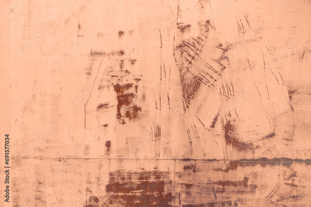 Obraz premium Empty grunge metallic texture with rusty stains in trendy color 2024 year Peach Fuzz