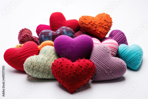 Small colorful fabric pillows shaped like a heart