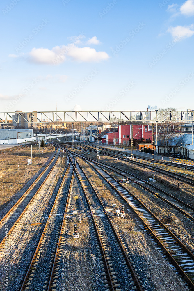 above view empty railroad tracks at railway siding on sunny autumn day