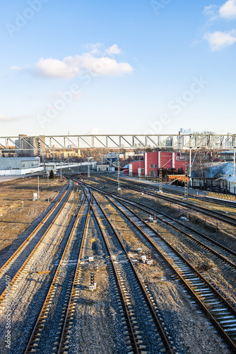 above view empty railroad tracks at railway siding on sunny autumn day © vvoe