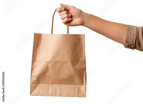 main qui tient un sac en papier comme pour une livraison de repas à domicile photo