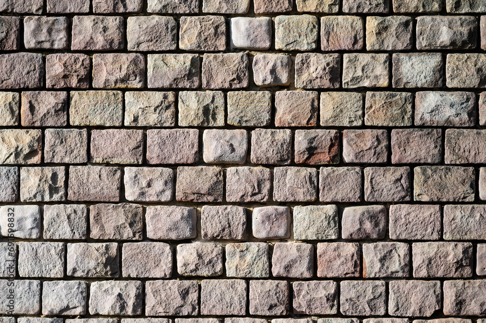 Rough brick blocks of a worn wall, Molenbeek, Brussels Capital, Belgium Rough brick blocks of a worn wall, Molenbeek, Brussels Capital, Belgium