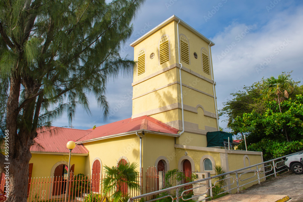 Fototapeta premium Roman Catholic Church Marigot (French: Eglise Saint-Martin de Tours) in historic downtown Marigot, French Collectivity of Saint Martin. 