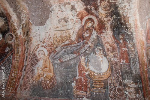 icons painted on arched ceiling in cave church of Soğanlı Valley, Cappadocia, Turkey photo