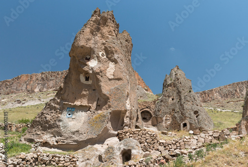 Snake Church with dove houses on a sunny day in Soğanlı Valley, Cappadocia, Turkey photo