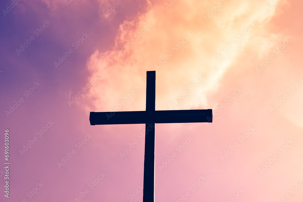 Black cross on a background of red and purple flaming sky, from heaven to earth fall fireballs, the concept of the end of the world, the Apocalypse and doomsday Black cross on a background of red and purple flaming sky, from heaven to earth fall fireballs, the concept of the end of the world, the Apocalypse and doomsday