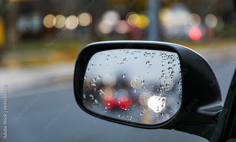 car mirror reflecting cityscape, symbolizing travel, reflection, urban lifestyle, and exploration. Blurred background car mirror reflecting cityscape, symbolizing travel, reflection, urban lifestyle, and exploration. Blurred background