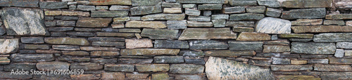 Stone texture close-up  rugged surface with natural imperfections  symbolizing durability  strength  timelessness. Ideal for architectural  nature  or background concepts