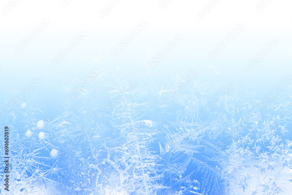 Frosty pattern on light blue background.