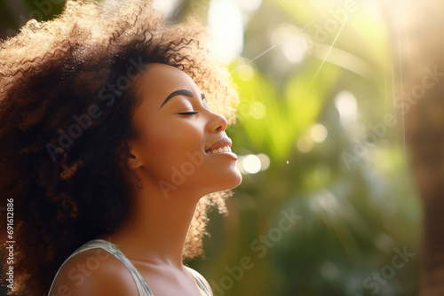 Radiant African American Woman Embracing Nature's Glow