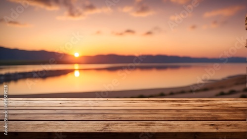 empty wooden table and blurred romantic sunset © Amir Bajric