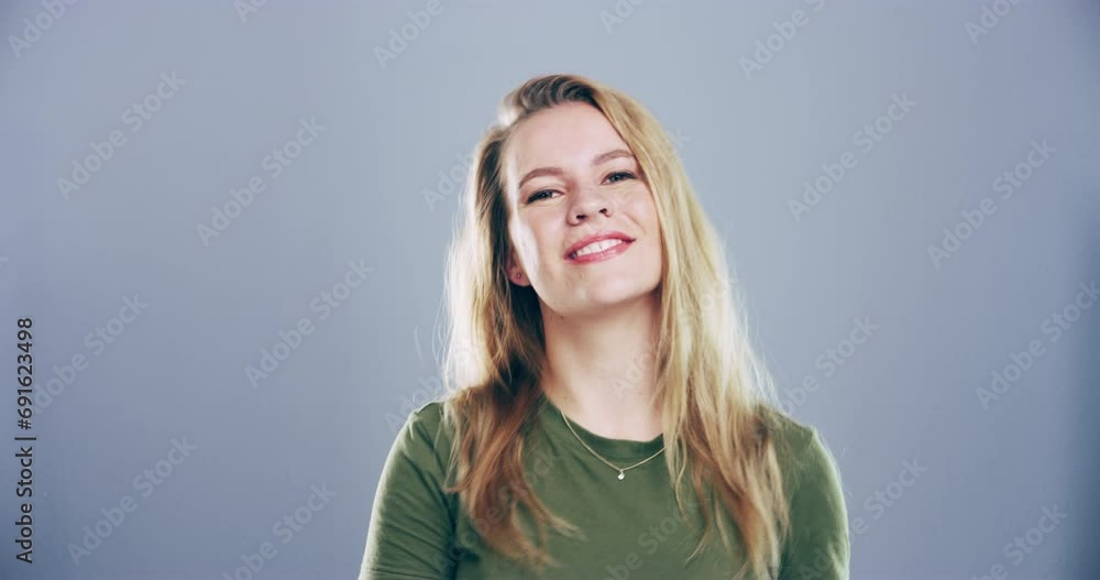 Heart hands, smile and woman in studio portrait with care, charity and peace for positive with kindness. Germany person, happy and face with love symbol, support and hope emotion by gray background Heart hands, smile and woman in studio portrait with care, charity and peace for positive with kindness. Germany person, happy and face with love symbol, support and hope emotion by gray background