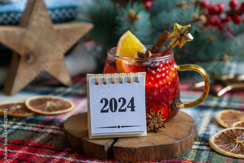 Christmas mulled wine with oranges and spices, calendar for 2024.