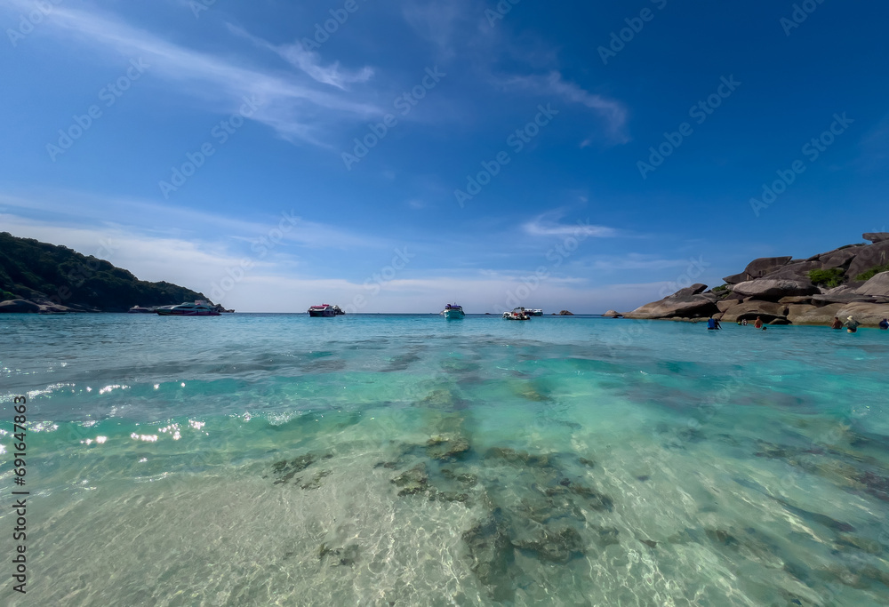 Kho Similan Island Coral reef teaming with reef fish of various colours. the Andaman Sea in  Thailand turquoise blue waters white sandy beaches