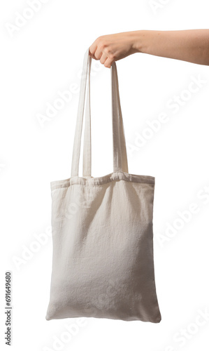 Showing tote bag mock up, isolated on white background. Shopper in hand