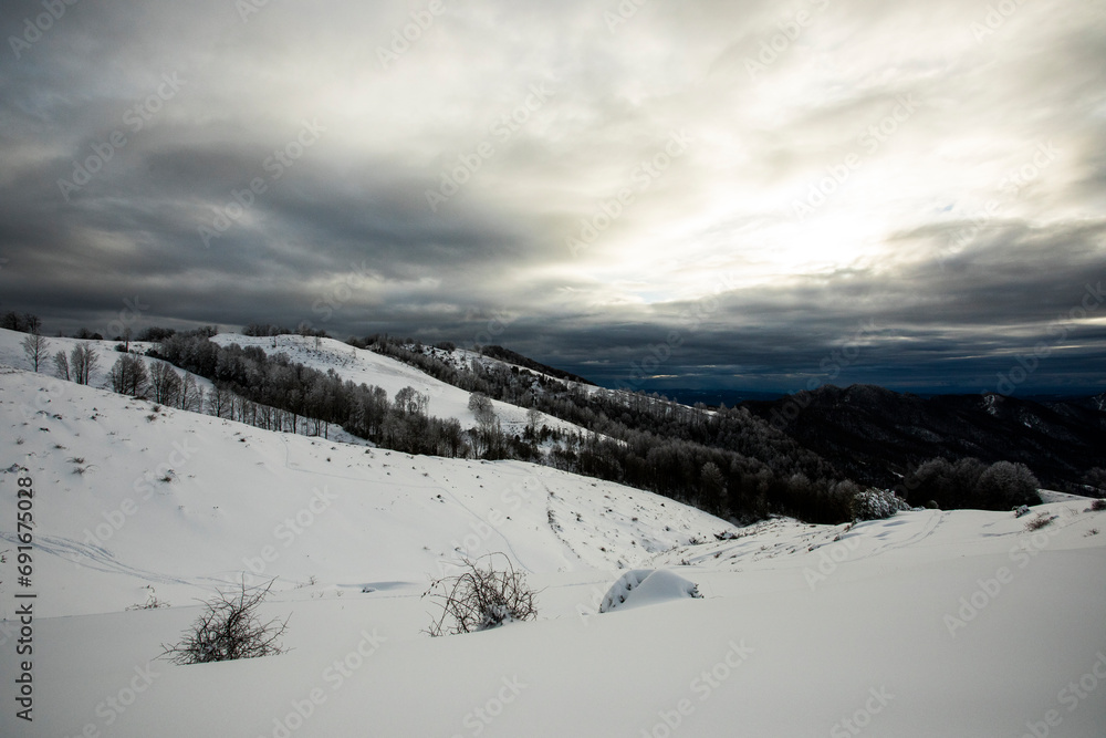 Obraz premium Winter snowfall in Collada De Bracons and Puigsacalm peak, La Garrotxa, Girona, Spain